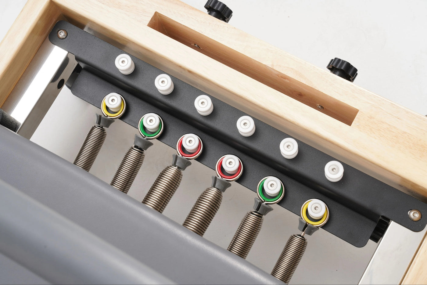 Foldbar Pilates reformer i egetræ