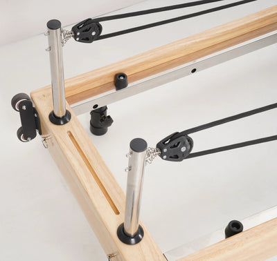 Foldbar Pilates reformer i egetræ